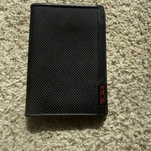 Tumi Black Textured Travel Wallet